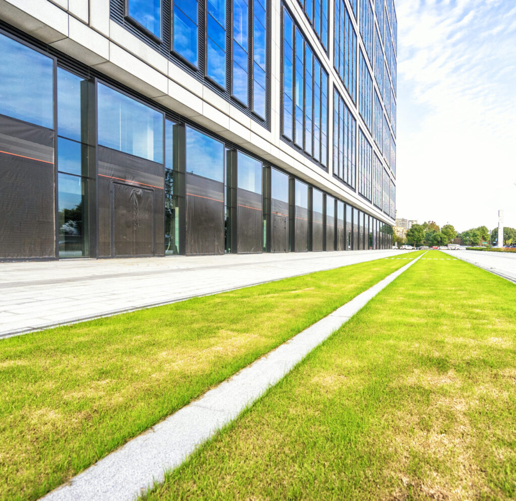 commercial building with a manicured green space